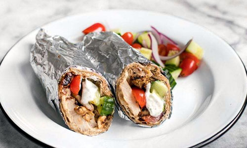 Greek Wrap Classic lightly toasted with side potato wedges